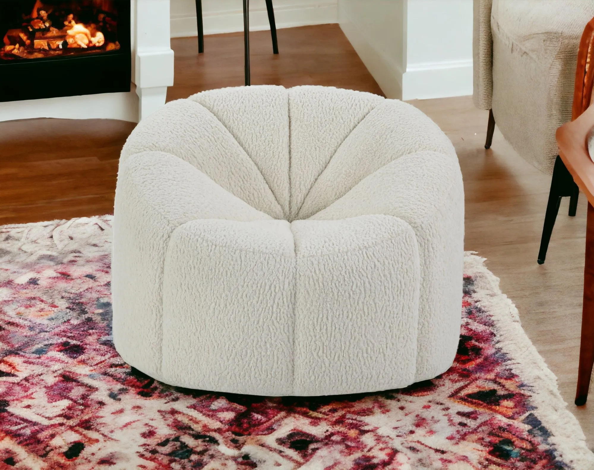 38 White And Black Sherpa Swivel Barrel Chair