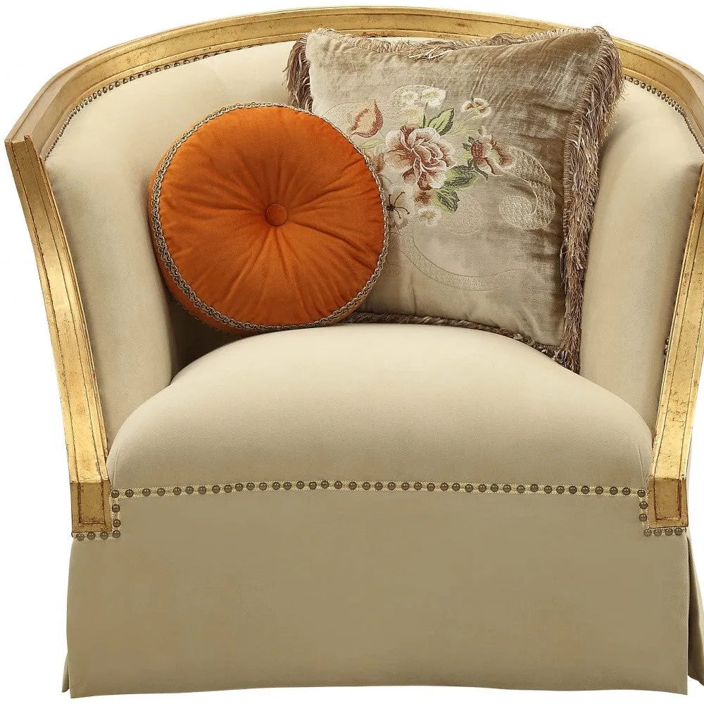 41 Tan and Gold Distressed Arm Chair and Toss Pillows