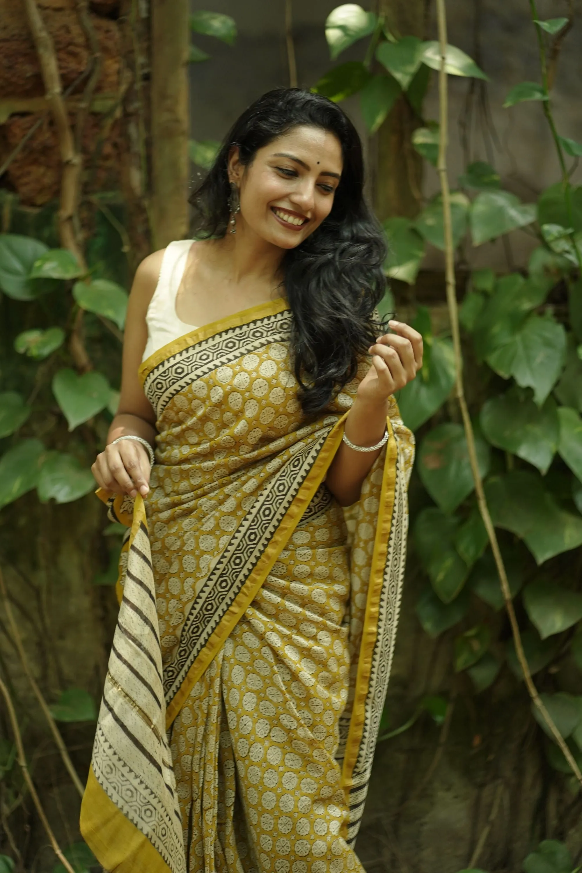 Roheda Bagru Syahi Begar yellow black silk cotton saree